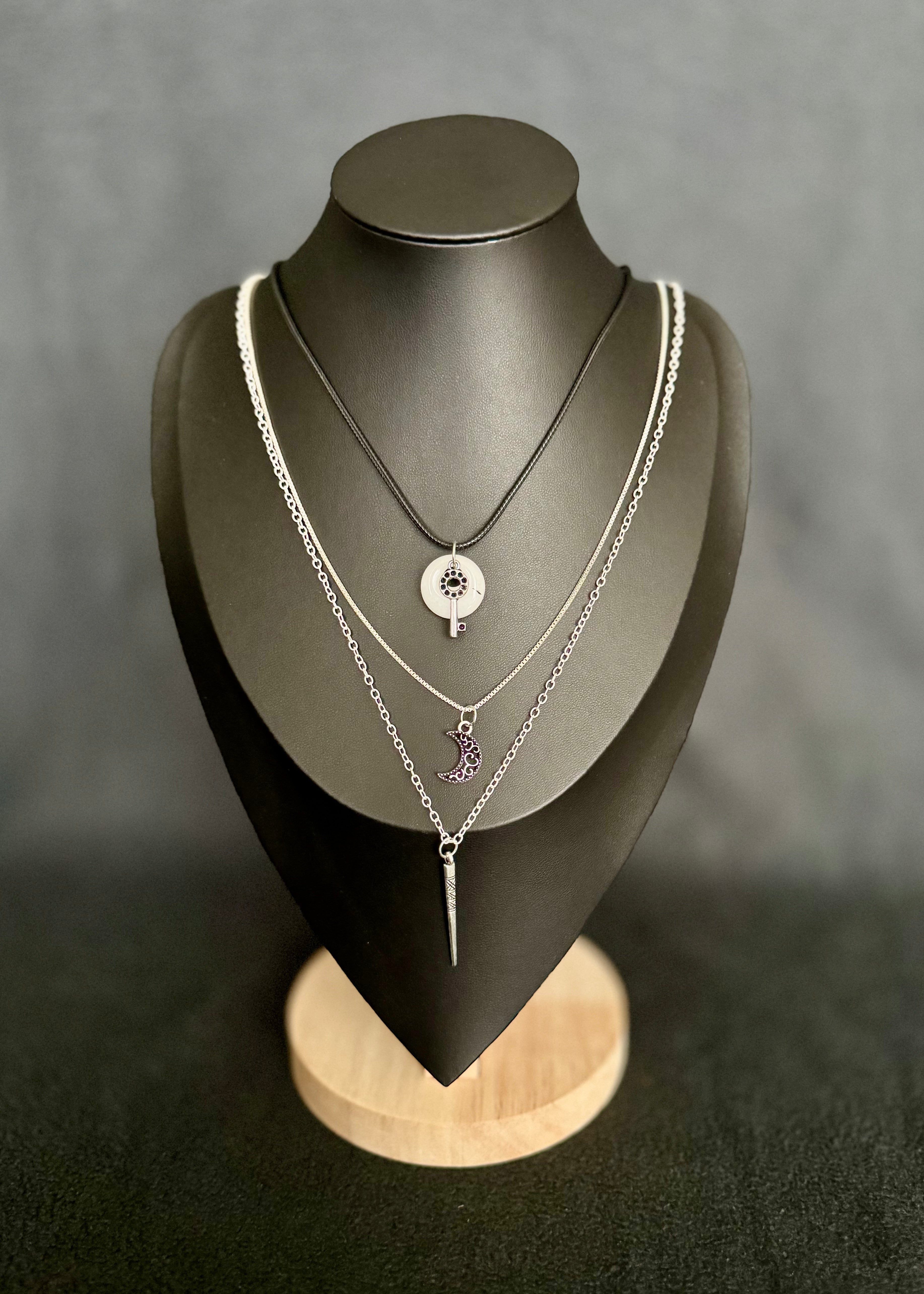 Triple Chain Four
Pendant Necklace